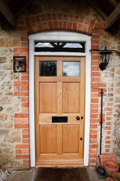 Bespoke front door with black ironmongery in Witney by Neil Bathgate joinery